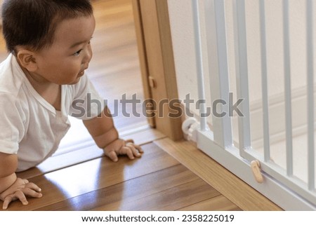 Similar – Image, Stock Photo Gating | boy in profile | be all ears.