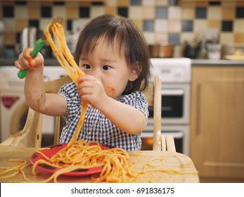 Baby Girl Eating Messy Spaghetti