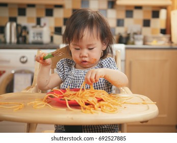 Baby Girl Eating Messy Spaghetti Home Stock Photo 692527885 | Shutterstock