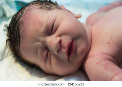 Baby Girl Just Born Laying On A Cradle At The Hospital