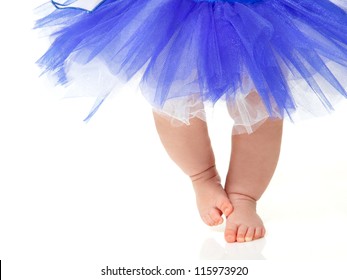baby girl like a ballet dancer in blue tutu, isolated on white background