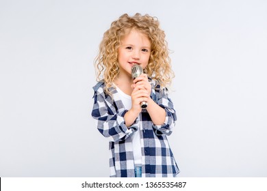 Baby Girl With Microphone Smiling Singing,Fat Girl Singing Song Into Microphone. Young Star, Looking For Talents.