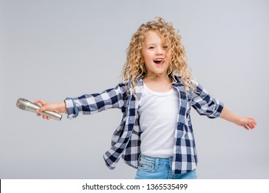 Baby Girl With Microphone Smiling Singing,Fat Girl Singing Song Into Microphone. Young Star, Looking For Talents.