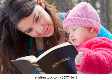 Baby Girl And Mom Reading KJV Bible (King James Version)