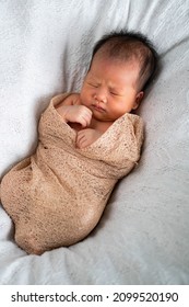 a baby girl on her first photo shoot - Shutterstock ID 2099520190