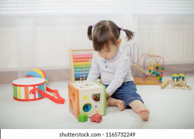 Baby Girl Play Toy Blocks At Home