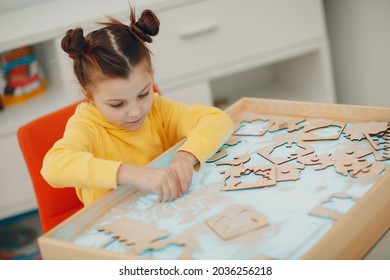 Baby Girl Playing With Sand Form Toy. Early Age Education. Toddler Cognitive Psychology Concept