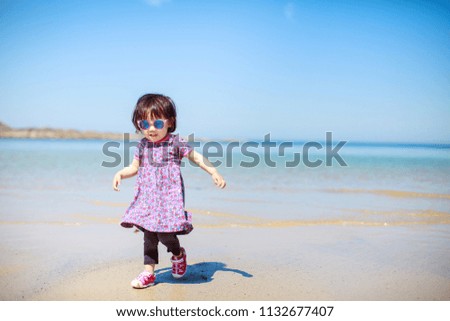 Similar – Image, Stock Photo baby girl outdoors in a park using mobile phone