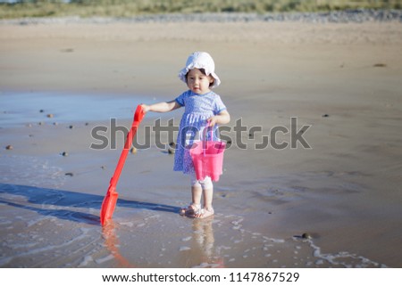 Similar – Image, Stock Photo baby girl outdoors in a park using mobile phone