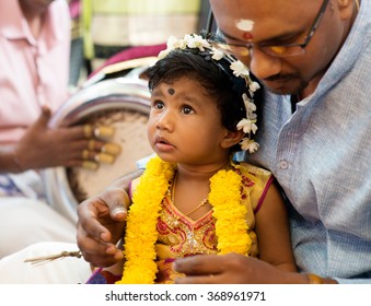 Baby Girl Received Prayers From The Karnvedh Events. Traditional Indian Hindus Ear Piercing Ceremony. India Special Rituals.