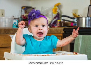 A Baby Girl Throws A Tantrum In The Kitchen