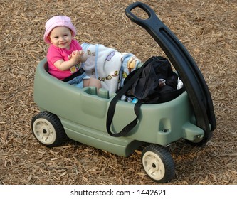 Baby Girl In Wagon