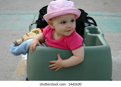 Baby Girl In Wagon