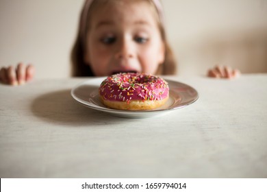 Baby Girl Want To Eat Sweet Donut.sugar Addiction Concept