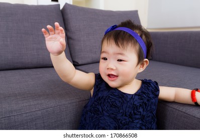 Baby Girl Waving Hand