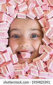 Baby Girl's Face In Marshmallows, Lots Of Sweets, Smiles And Big Baby Eyes