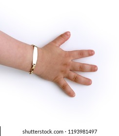 Baby Hand With Bracelet On A White Background.