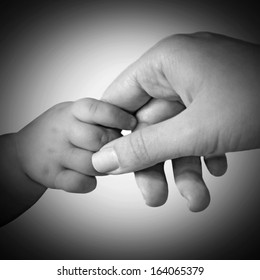  Baby Hand Gently Holding Mother's Finger, Black And White Style