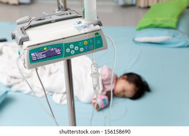 Baby Have Diarrhea And Sleep On A Bed In Hospital With Saline Intravenous (iv)