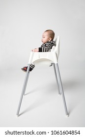 A Baby In A High Chair