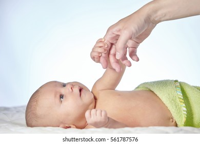 Baby  Holding Mother Finger