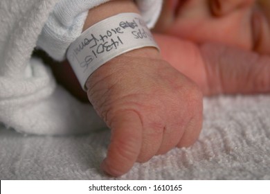 Baby Identification Bracelet On Newborn, Focus Is On The Bracelet