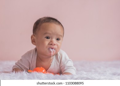 baby Infant five months not feeling well and vomiting milk.