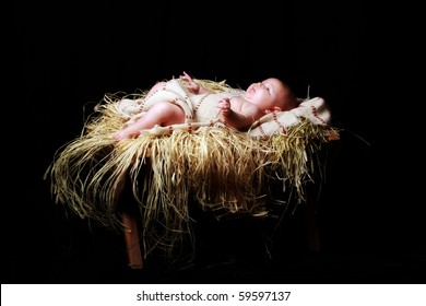 Baby Jesus in the manger - Shutterstock ID 59597137