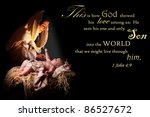 Baby Jesus reaching out of the manger for his mother, the virgin Mary and bathing her in his light.  Image also contains a verse from 1John appropriate for Christmas