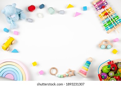 Baby Kids Toys Frame On White Background. Top View. Flat Lay. Copy Space For Text