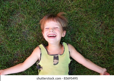 Baby Laughing, Lying On The Grass