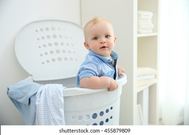 Baby In Laundry Basket