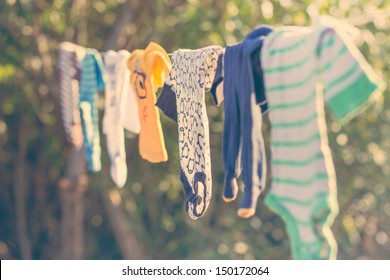 Baby Laundry Hanging On A Clothesline