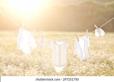 Baby Laundry Hanging On A Clothesline