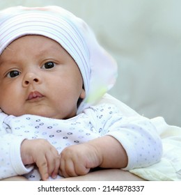 Baby Looking With Big Eyes Just After Having A Good Sleep In Bed Stock Photos  