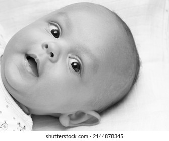 Baby Looking With Big Eyes Just After Having A Good Sleep In Bed Stock Photos 