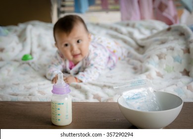 Baby Looking Milk Storage Bottles With Hunger.(mother's  Breastmilk Storage Bags Freezer)