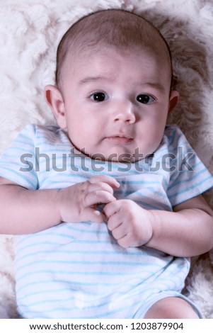 Similar – Der kleine Junge im Schlafzimmer im Bett.