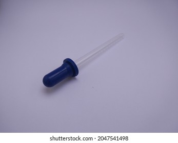 Baby Medicine Dropper On White Background