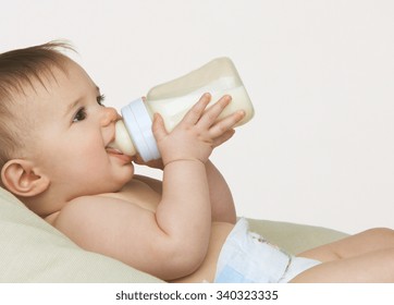 Baby With A Milk Bottle