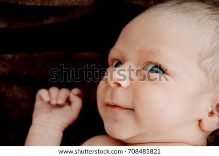 Similar – Cute baby in hands of crop anonymous father