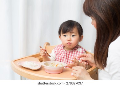 Baby & Mom Enjoying Lunch