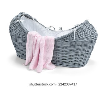 Baby moses basket with pink blanket, isolated on the white background, clipping path included. - Shutterstock ID 2242387417