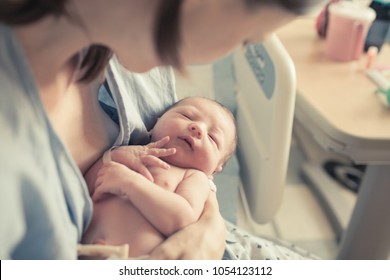 Baby and mother in hospital. New life concept.  