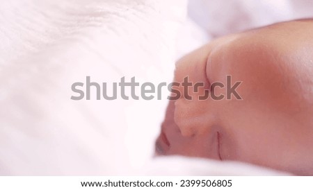 Similar – Newborn lying on bed embraced by her mother