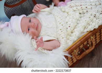 Baby Newborn Sleeping Wrapped Up In A Warm Blanket
