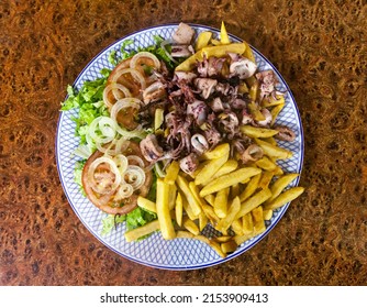 Baby Octopuses And French Fries On A Plate