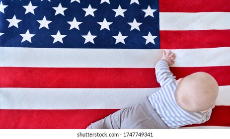 Baby On American Flag Background. Son Of America.