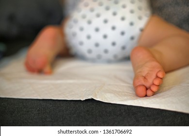 Baby On A Changing Mat