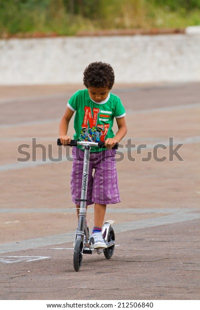 baby on scooter